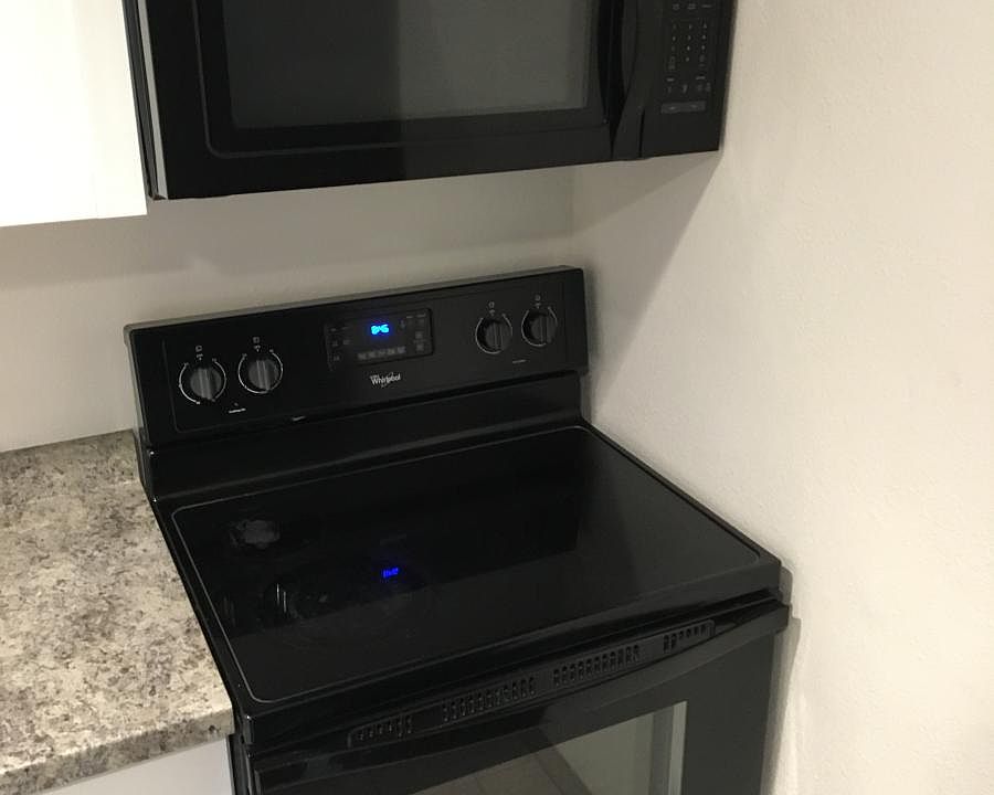 Microwave, self cleaning glass top stove