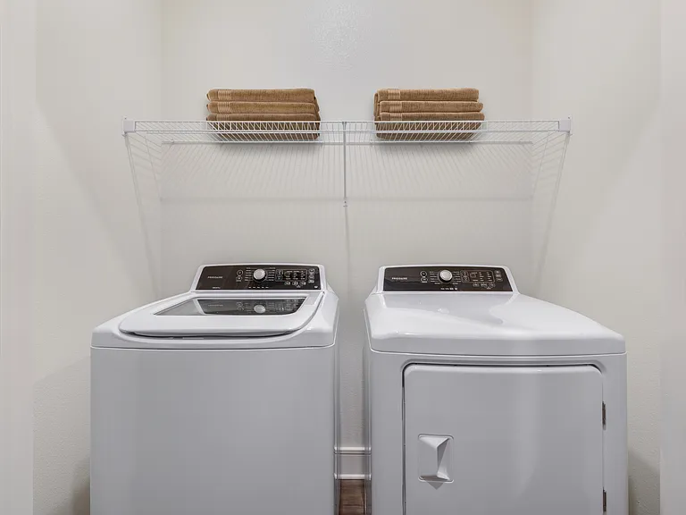 Simplify your routine with a washer and dryer inside your home.