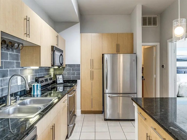 Open kitchen with island bar.
