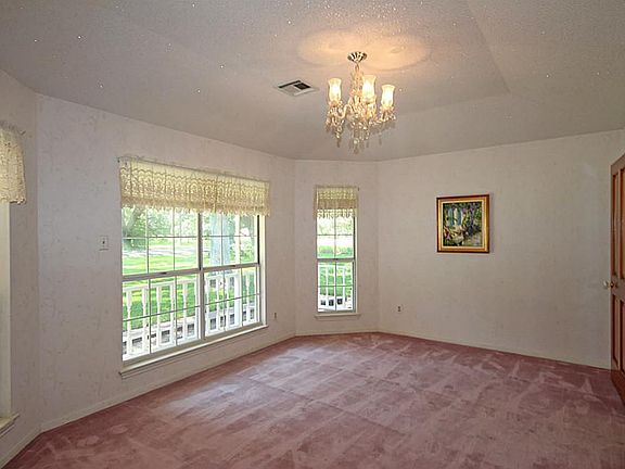 FORMAL LIVING/DINING OR STUDY NOTE THE WINDOWS THAT ALLOW IN NATURAL LIGHT AND GORGEOUS VIEW OF THE FRONT YARD