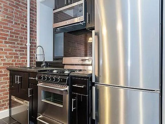 2nd image of 420 W 51st St APT 1