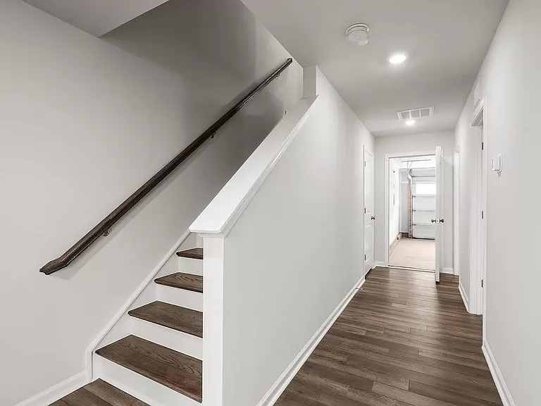 stairs on the first floor bedroom and back door