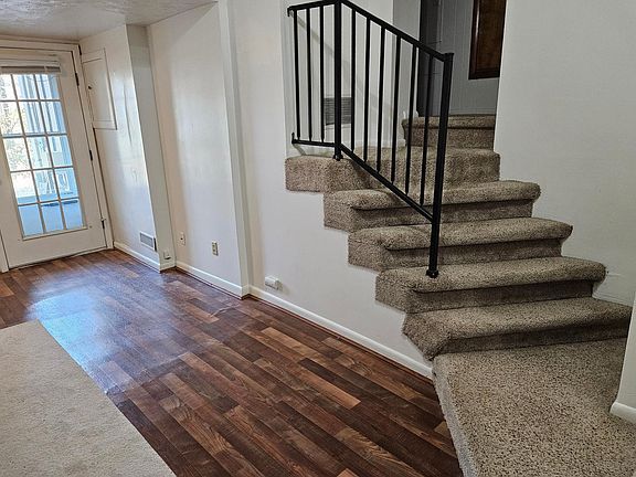Stairs to bedroom and bathroom
