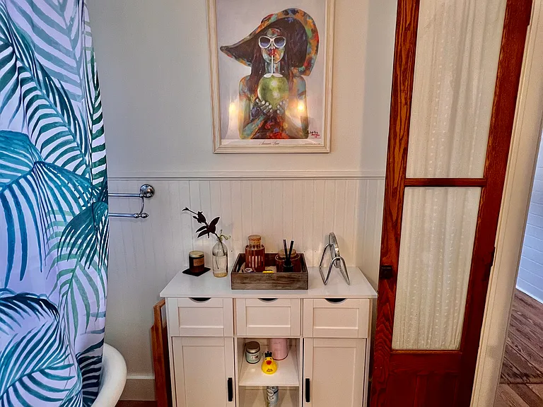 Clawfoot tub with shower.
