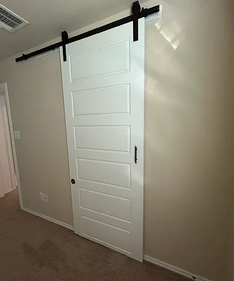 Barn doors in all bedrooms