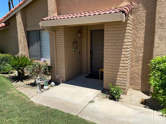 Front door entrance next to pool