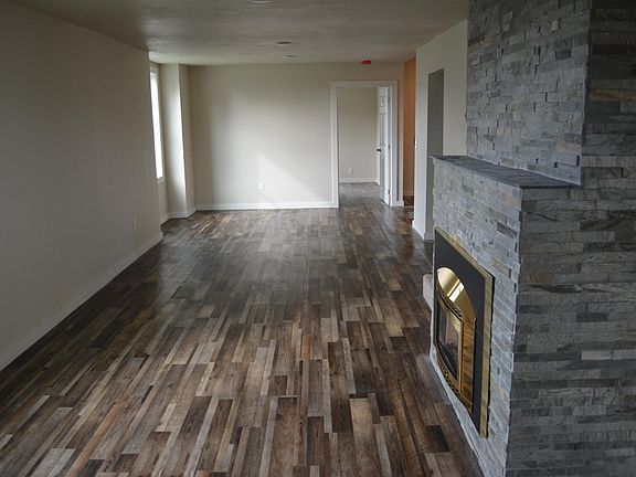 Very large living room. Dining table at the end? Maybe. There's lots of room in the kitchen too.