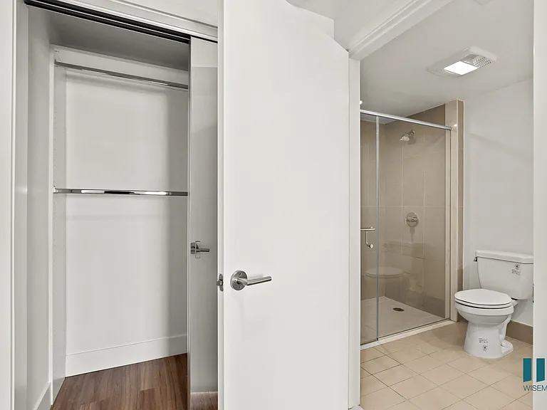 Bedroom with Hanging Closet and Bathroom with Stand-In Shower
