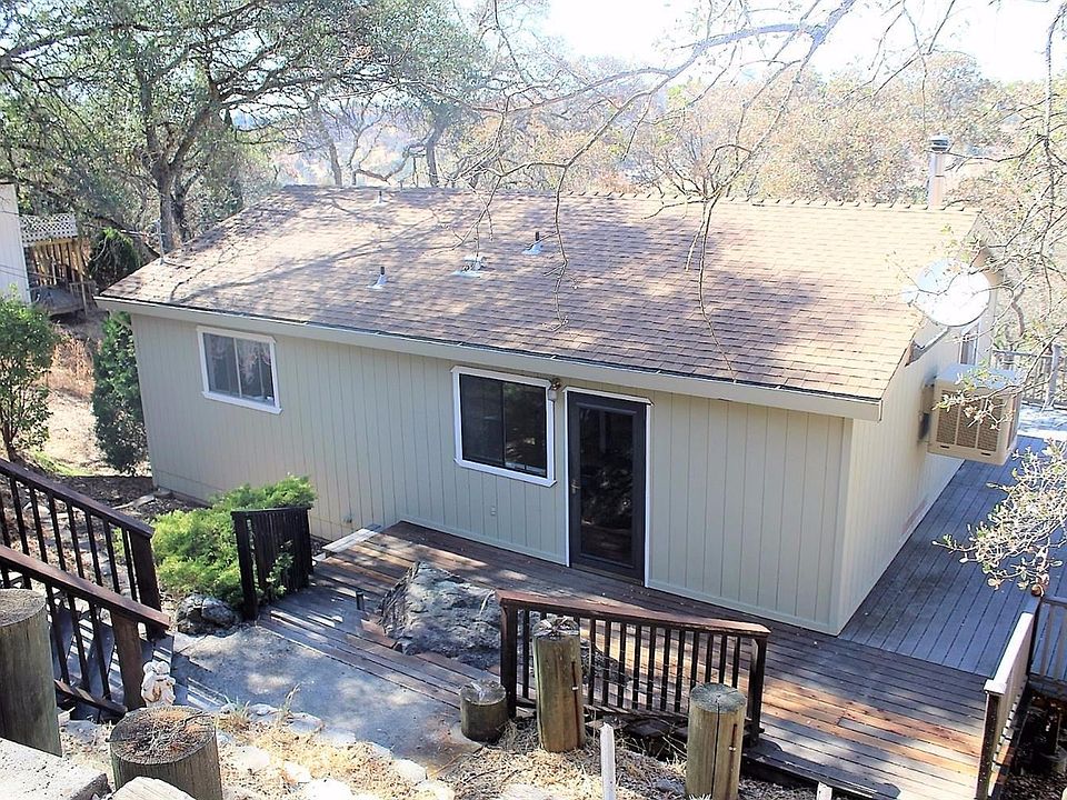 Ranch style yet contemporary in design.  Many great features about this hillside home.