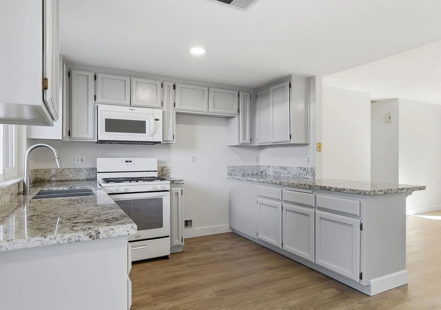 $1,000 Off First Month's Rent | 3-Bedroom Home with Detached 2-Car Garage, Fireplace & Private Patio — Photo 4
