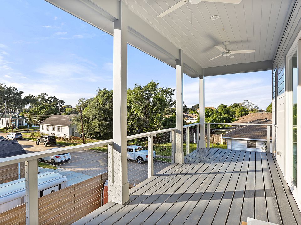 Incredible 10' deep x 24' wide balcony with outdoor fans and views of downtown high rises.