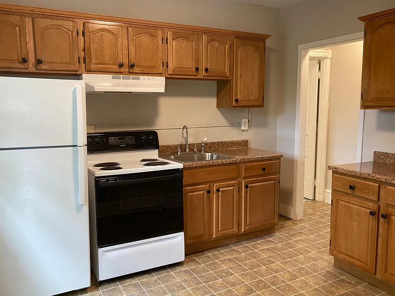 New refrigerator, new kitchen cabinetry.