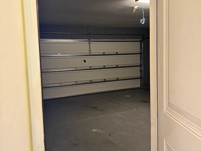 Looking into garage from front hall