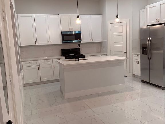 4th image of 7002 S Hall St #A