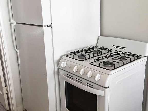 Gas stove and full size refrigerator