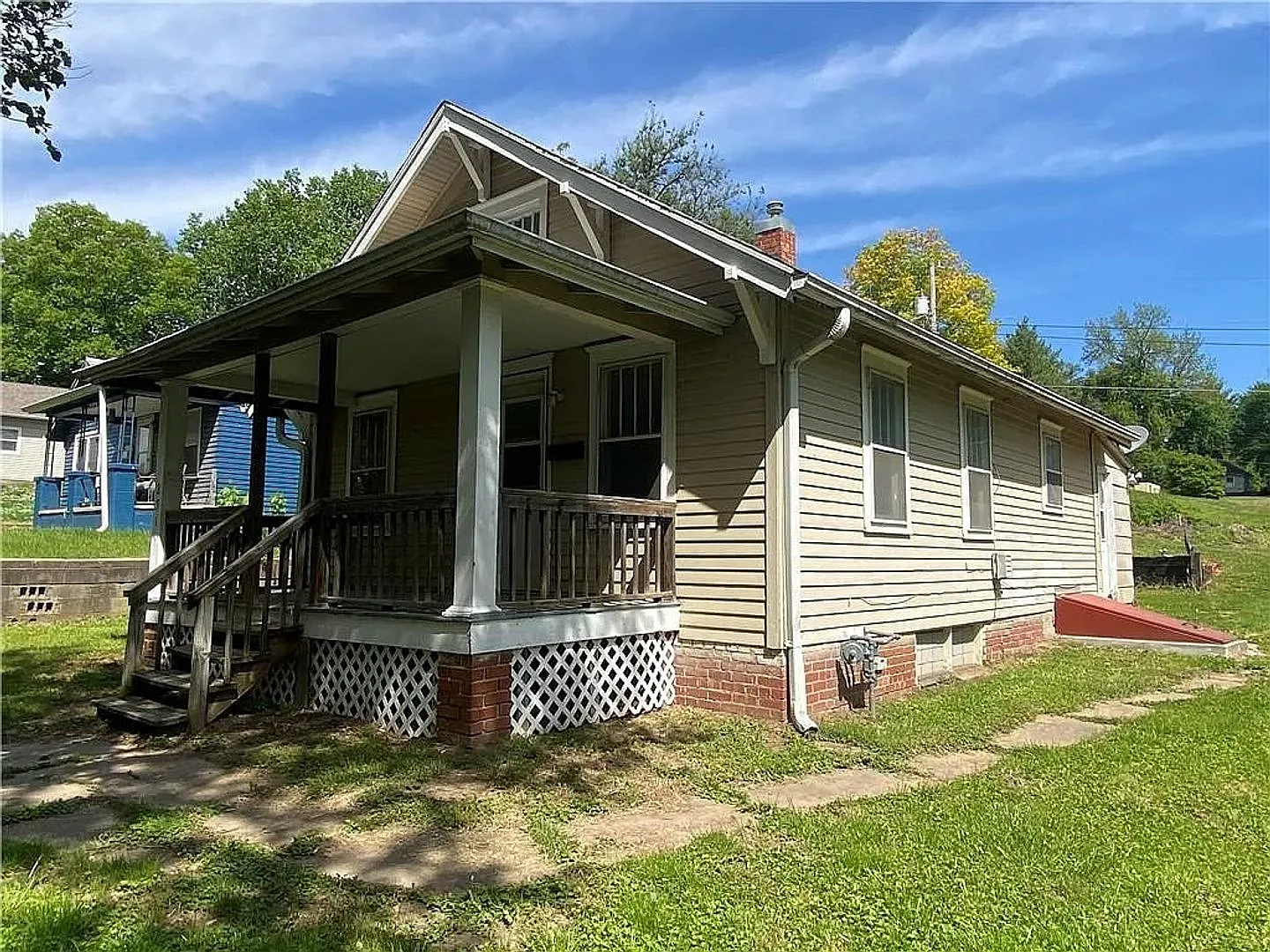 2-Bedroom Home with Covered Front Porch, Main-Floor Laundry & Off-Street Parking — Photo 3