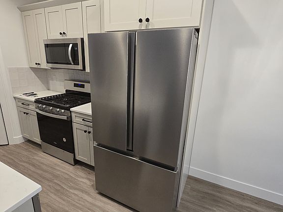 Fridge with filtered water spout and ice