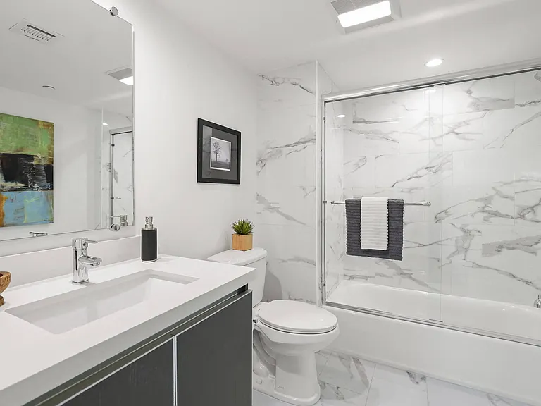 Bathrooms with Full-Size Bathtubs and Vanity Cabinet Storage