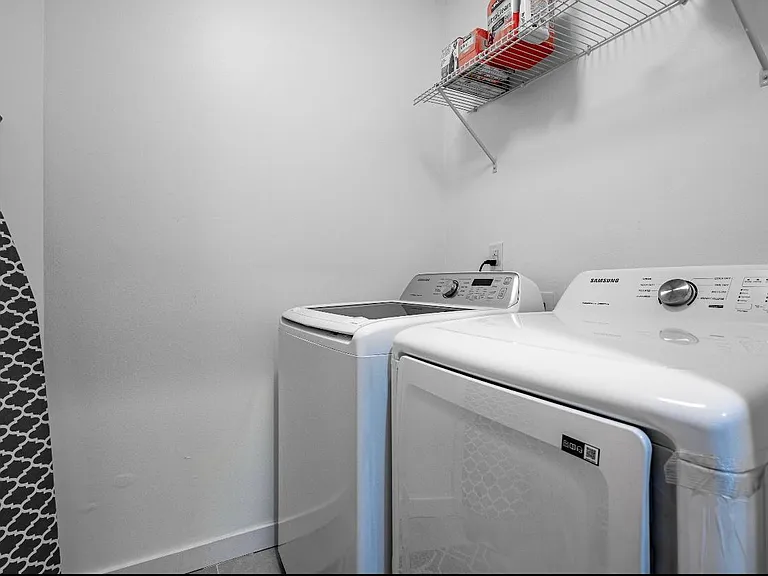 Laundry Room with ironing supplies