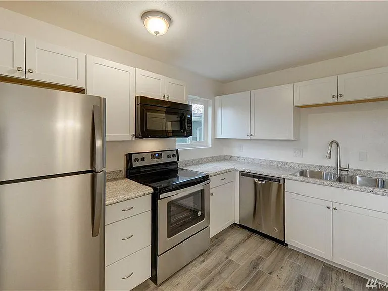 Old countertops - New quartz countertops are in the kitchen.