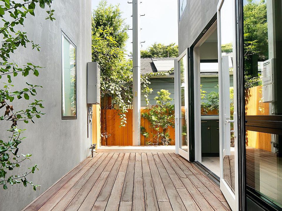 Deck walkway outside kitchen at 633 Palms Blvd. apartments in Venice, California.