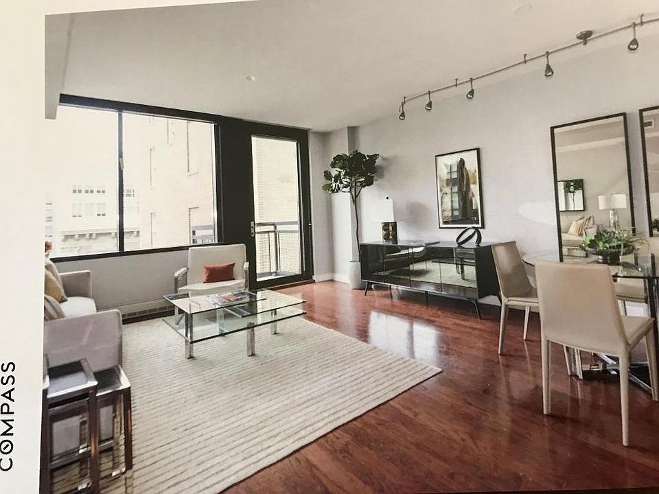 great room with large sunny windows.