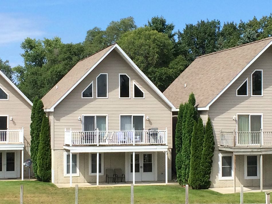 3 bedroom 2 bath River front Condo. This unit has a partially finished walk out level and a detached garage. The boat slip is right in front of the unit so you can park your vessel and walk right in. Close to the Beach and downtown Port Austin. The open floor plan is great for the family and all your guests. This would make a great year round home or a weekend getaway.