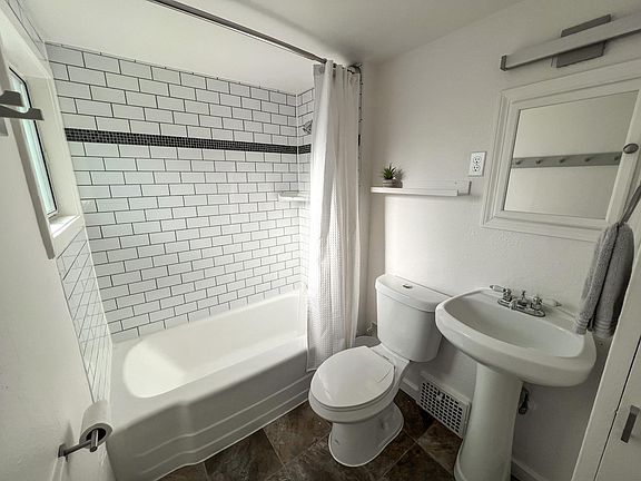 Tiled shower with updated finishes