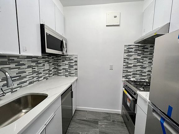 4th image of 99-05 63rd Dr #14F