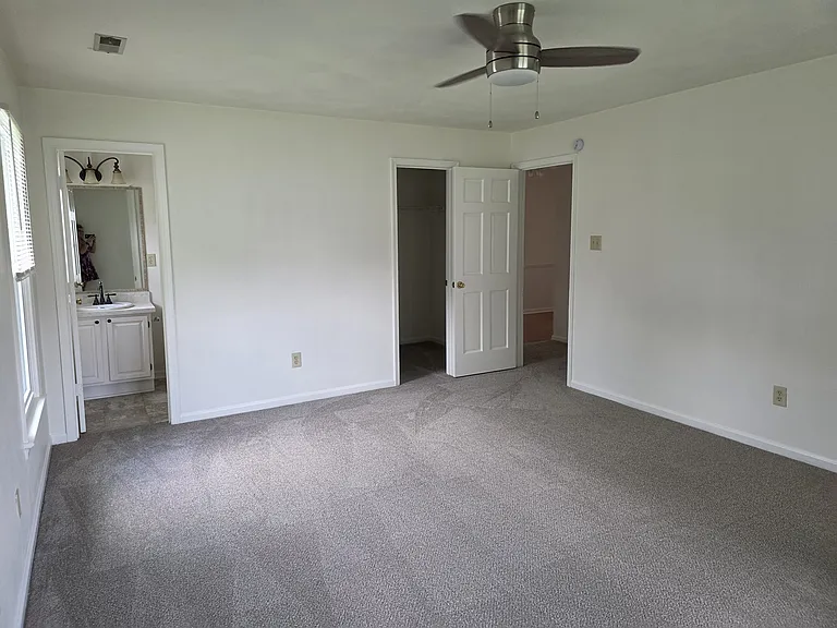 Primary bedroom with second closet and bathroom
