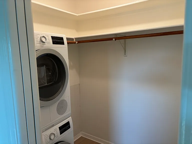 Master bedroom walk-in closet. In-unit washer and dryer (Bosch)