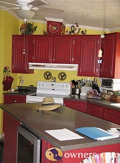 Kitchen with 6' island and corian counters