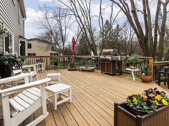 Expand your living and entertaining space to the outdoors on this large multi-level deck.  Enough room for outdoor furniture, grilling space and more!