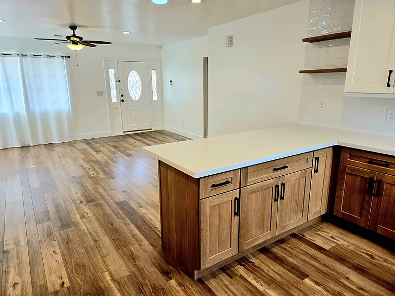 Completely remodeled kitchen with new cabinets, new countertops, new refrigerator, new stove / range, new microwave, new dishwasher, new sink, new faucet. Everything is NEW and Clean !
