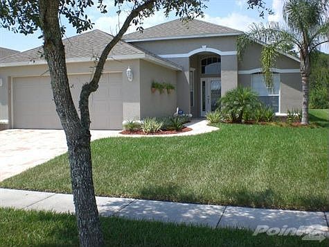 Front w/paver driveway