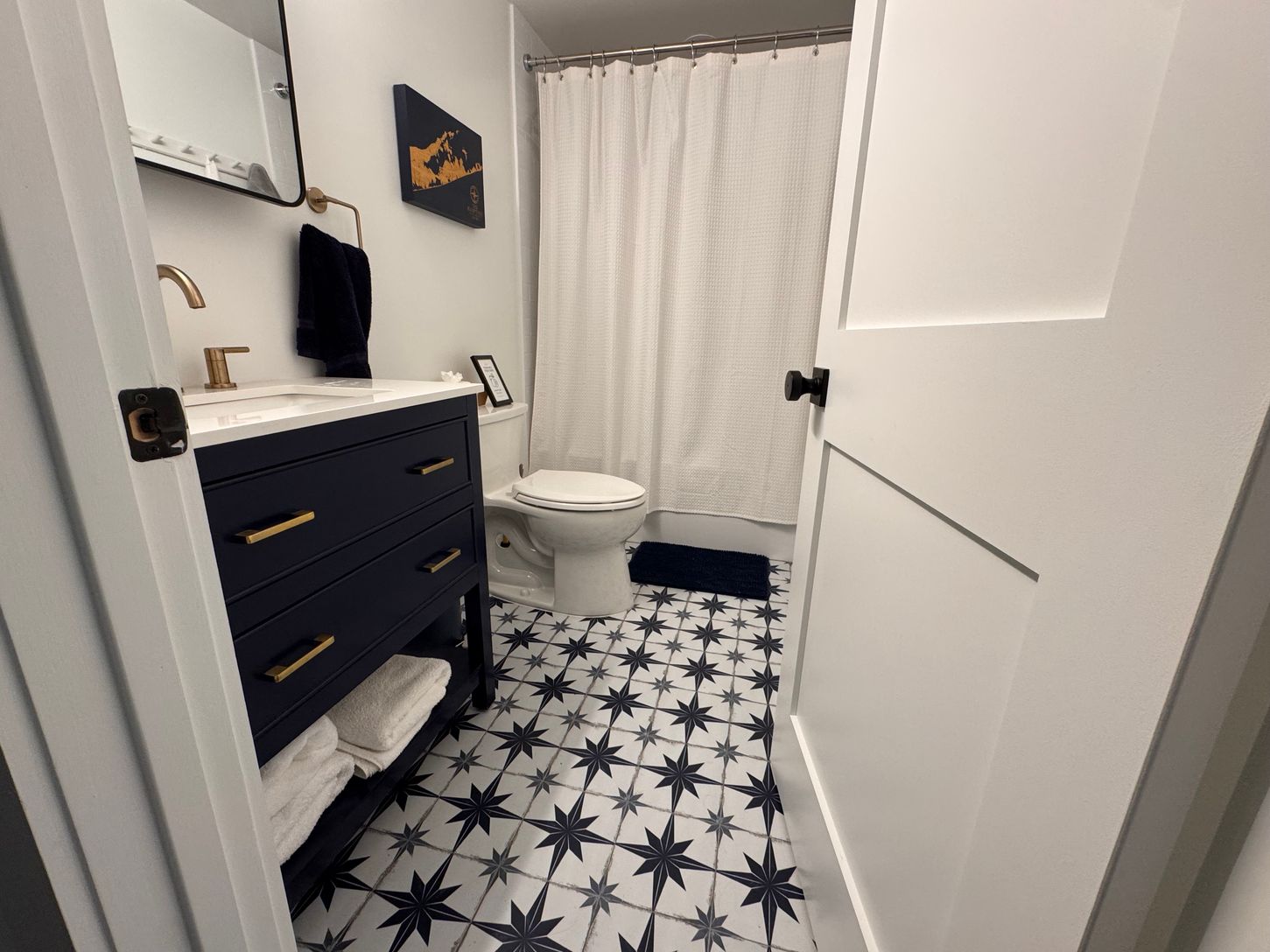  newly renovated hall bathroom with shower/tub combination