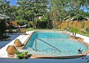 Lovely Landscaped Pool Area and fenced yard