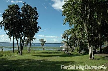 Long View of Santa Fe Lake
						:
						Step out the door to your enclosed boathouse and head out for a day on the lake!