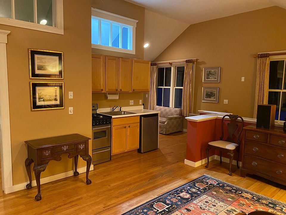 Kitchenette with oven, stove, microwave and coffee maker