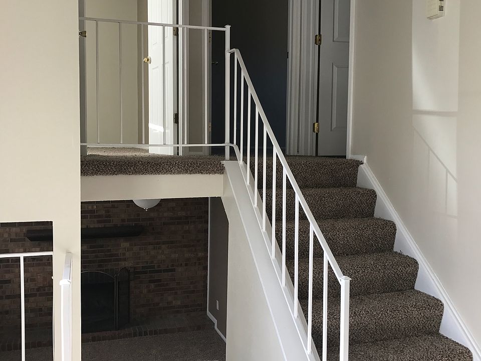 Stairs leading to family room and bedrooms