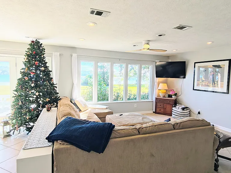 Living area with front bedroom to the right.