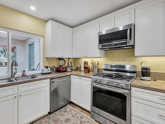 Under cabinet lighting and LED lights in the ceiling