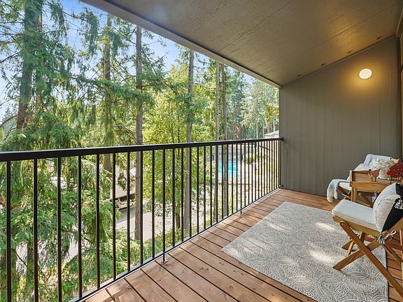 View from the balcony - to the right, Sixty-01's main pool and clubhouse building, straight ahead, filtered water views of the main lake