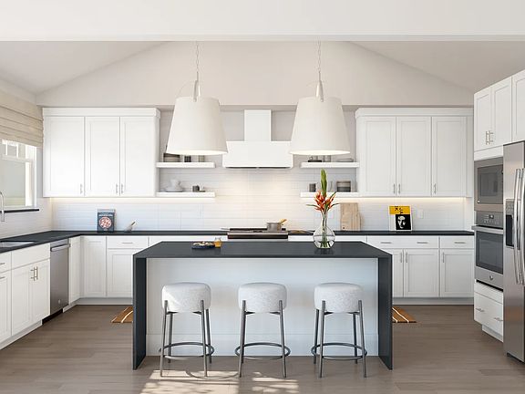 Kitchen with pendant lighting and subway tile backsplash