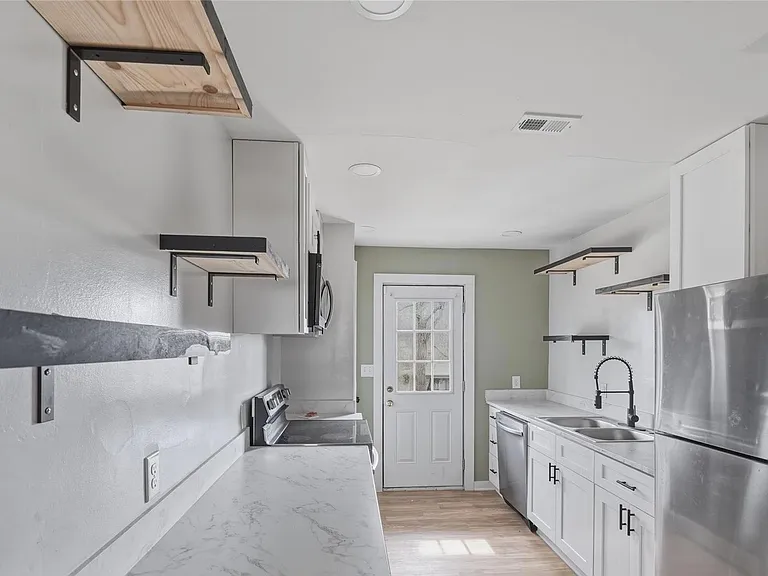 3027 Remington St — Photo 4