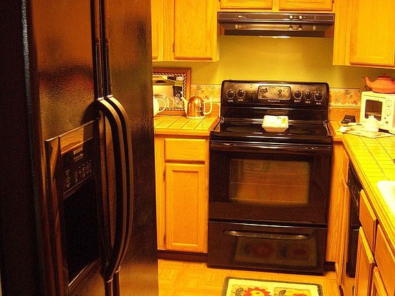 Open kithchen with breezeway to dining room.  All appliances stay.