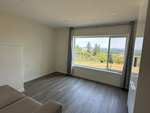 Living Room with storage space and ocean view.