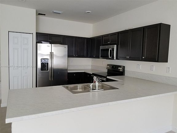 5th image of 9393 W 33rd Ln #9393