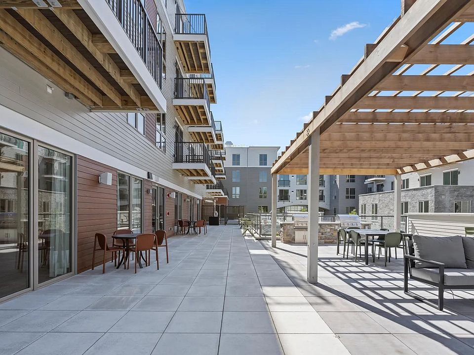 At Modera Newton, select apartment homes feature private balconies and patios.