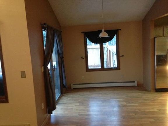 Dining room in between living room and kitchen